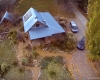 straw bale solar-powered home as seen from a camera drone.